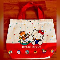 New Without Tags 10”L X 8”H Strap Drop 5” Cute Red Bag For Gift, Cute Red Bags For Gifts, Playful Red Shoulder Bag For Daily Use, Playful Red Bag For Gift, Playful Hello Kitty Print Rectangular Bags, White Hello Kitty Bag For Daily Use, Casual Hello Kitty Print Tote Shoulder Bag, Playful White Bags With Hello Kitty Print, White Bag With Cat Design For Shopping