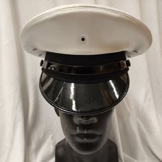 Broadway Quality / Made In Usa The Maritime Cap Is A Well-Made Us Manufactured Cap. . The Material Of The Top Is White Naugalite. Color: Maritime White / Cadet Black Size Guide: American / Nearest 1/8 Inch / Metric Cm / Size Code 6 5/8 20 3/4 53 X-Small / Child M 6 3/4 21 1/8 54 Small 6 7/8 21 1/2 55 Small / Child L 7 21 7/8 56 Medium 7 1/8 22 1/4 57 Medium 7 1/4 22 5/8 58 Classic Adjustable Cap For Costumes, Classic Adjustable Visor Fitted Hat, Classic Adjustable Mini Cap Hat, Classic Fitted Visor Hat, Camo Bucket Hat, Cabbie Hat, Cadet Hat, Navy Hats, Ski Hats