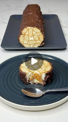 a piece of cake on a plate with a spoon