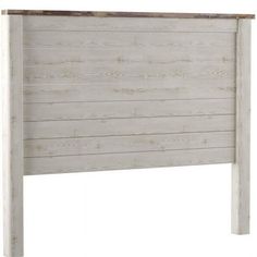 a white headboard with wooden slats on the top and bottom part of it