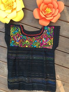 Gorgeous hand embroidered Mexican blouse is comfortable, fresh and stylish With beautiful Paloma embroidery detailed work on the top Get the boho style you like Perfect to wear with your favorite jeans Perfect for summer season! You will love your unique one of a kind piece Is a MUST HAVE in you wardrobe Every blouse is individually handcrafted Color may vary on stitching as each blouse is unique Perfect for any occasion Perfect gift idea *accessories sold separately* **HAND WASH ONLY** Follow u Folk Peasant Top With Multicolor Embroidered Neckline, Fiesta Top With Multicolor Embroidered Neckline, Fiesta Multicolor Embroidered Top With Embroidered Neckline, Fiesta Blouse With Multicolor Embroidered Neckline, Peasant Top With Multicolor Embroidery, Multicolor Floral Embroidered Top For Fiesta, Multicolor Embroidered Folk Top With Embroidered Border, Folk Style Multicolor Embroidered Top For Fiesta, Multicolor Embroidered Top For Fiesta