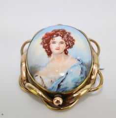 Pinchbeck Painted Cameo Brooch Details ~  Super antique brooch with hand painted porcelain portrait, depicting a lovelyl 19th century lady in blue, her hair in ringlets tied up in a red ribbon.  It has a rather grand pinchbeck setting which is typical of the traditional Victorian brooch, and has a bar and C clasp fastening. c 1850s. It would make a super gift, for a birthday or just a treat! Measures ~  5cm X 4cm  ( approx 2" x 1.5" in inches) Condition ~  Good vintage condition. Thank you for your interest Please read the shop policies before purchasing as they contain important information about payment and shipping to help you Victorian Style Enamel Pin Gift, Faux Pearl Jewelry, Victorian Brooch, Vintage Givenchy, Glitter Crafts, Faux Pearl Earrings, Super Gifts, Antique Brooches, Cameo Brooch