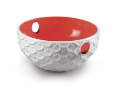 a white and red bowl with holes in it