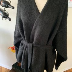 Brand New, Never Worn Size L Black V-neck Cozy Sweater Coat, Cozy Black V-neck Outerwear, Fitted Black Sweater Coat For Cold Weather, Black Soft Knit Cardigan For Work, Black Sweater For Loungewear In Fall, Black Cardigan For Spring And Cold Weather, Black Cardigan For Spring Cold Weather, Black Cardigan For Cold Weather In Spring, Black Cardigan For Spring