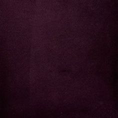 an image of a purple background that looks like it has been dyed with dark colors