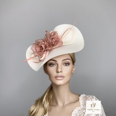 This stunning ivory hat, is adorned with a beatutiful silk flower in pink shades. This hat is perfect for horse racing like the  Kentucky Derby, Royal Ascot, Breeders Cup... luncheons, High Tea parties, Bridal Showers, wedding guest.. or any special ocasion. It is mounted on a thin satin cover headband (with silicone ends to prevent a headache) and small comb.  You can choose the side of the head where you like to wear the fascinator. Follow this link for more beautiful choices from 'Sophie Young Hats'  https://www.etsy.com/shop/sophieyounghats Pale Pink Weddings, Ivory Hat, Hat Tea Party, Tea Hats, Hat Cream, Breeders Cup, Ascot Hats, Bride Hat, Tea Party Hats