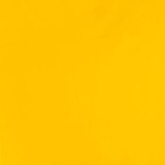 an orange and yellow background with some black dots on the bottom right corner in the center