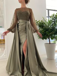 Details: -Olive green colour -Taffeta fabric and tulle with beads -Mermaid with over skirt -For special occasions Soiree Dress, Evening Dresses Online, Satin Evening Dresses, Cheap Evening Dresses, Long Sleeve Prom, Elegant Dresses Classy, Party Kleidung, فستان سهرة, Beaded Gown