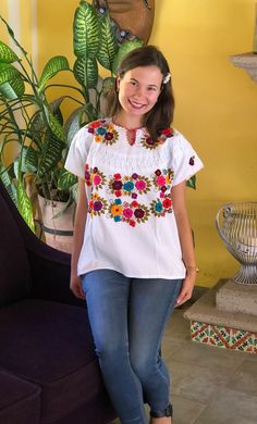 Mexican blouse, blouse with clips and fine embroidery, handmade blouse, blouse with multicolored floral embroidery, ethnic blouse, blouse of blanket. The embroidery of each blouse is unique so it may vary. This blouse is one size and fits S/M Mexican textile art has centuries of history and creativity throughout the country. Mexico is recognized as one of the leading countries with a beautiful aristic production in the textile world, miraculous hands of talented artisans from different states of Folk Multicolor Embroidered Tops For Cinco De Mayo, Folk Style Multicolor Embroidered Top For Cinco De Mayo, Multicolor Embroidered Short Sleeve Blouse For Cinco De Mayo, Casual Multicolor Blouse With Intricate Embroidery, Casual Multicolor Embroidered Blouse, Cinco De Mayo Multicolor Tops With Floral Embroidery, Multicolor Cotton Blouse For Fiesta, Cinco De Mayo Fiesta Blouse With Multicolor Embroidery, White Tops For Summer Fiesta