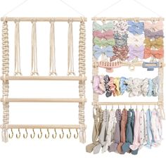 a wooden rack with clothes hanging from it's sides