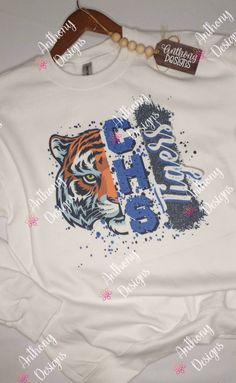 a t - shirt with an image of a tiger on it