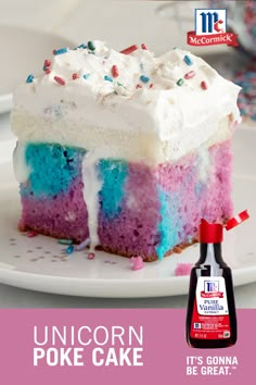 a piece of cake with icing and sprinkles on it