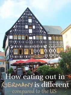 an old building with the words how eating out in germany is different compared to the us