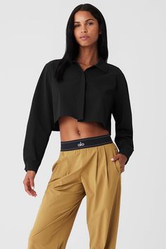 The Cropped Take Me Out Button Up is a year-round layer to wear on repeat. Made with a twill woven that’s lightweight yet warming along with hidden buttons for a sleek look, this cropped and collared long sleeve is the shacket, reimagined. Layer it over a bra top and leggings for an instant outfit that wears well anywhere. Fall Layering Tops By Alo Yoga, Alo Yoga Tops For Fall Layering, Alo Yoga Fall Layering Tops, Trendy Cropped Shirt For Daywear, Alo Yoga Cropped Tops For Fall, Trendy Alo Yoga Tops, Chic Button-up Cropped Shirt For Fall, Cropped Tops With Button Cuffs For Fall, Chic Relaxed Fit Cropped Shirt For Fall