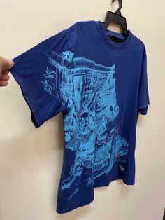 "Item :Vintage conart fusion t shirt Armpit to Armpit :22\" Length :29\" Large metarials 100%cotton conditions used vintage refer to pics carefully made in usa original / authentic ACCEPT PAYMENT: PAYPAL ONLY ALL ITEM WILL BE SHIPPED WITHIN 3-5 BUSINESS DAY AFTER RECEIVING CLEARED PAYMENT AND DELIVERED 3-5WEEKS WE ARE USING POST MALAYSIAN WITH YOUR TRACKING NUMBER. PLEASE LEAVE YOUR PHONE NUMBER DURING PURCHASE.PHONE NUMBER REQUIRES FOR MALAYSIAN POST (VERY IMPORTANT) THANKS FOR VIEWING 👍😊" Blue Vintage T-shirt With Relaxed Fit, Cotton Short Sleeve Shirt With Graffiti Print, Casual Streetwear Shirt With Vintage Print, Casual Shirt With Vintage Print For Streetwear, Retro Cotton Tops With Graffiti Print, Vintage Cotton Shirt For Fan Merchandise, Short Sleeve Cotton T-shirt With Graffiti Print, Short Sleeve Cotton Tops With Vintage Print, Vintage Print Cotton Tops With Short Sleeves