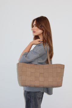 The Tilda Latte Bag by Nakedvice is a brown leather tote bag crafted from woven panels of smooth leather. Featuring a structured rectangle base and metal stud closure, The Tilda will quickly become your favourite everyday tote bag.

 Colour: Latte Brown Leather Tote Bag, Travel Belt, Everyday Tote Bag, Craft Tote Bag, Brown Leather Totes, Everyday Tote, Leather Tote Bag, Shoe Sale, Shoes Heels Boots