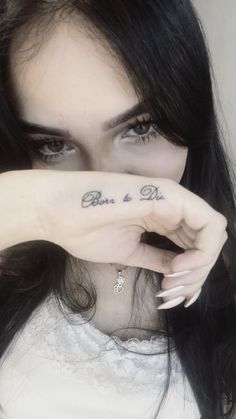 a woman holding her hand up to her face with the word love and do written on it