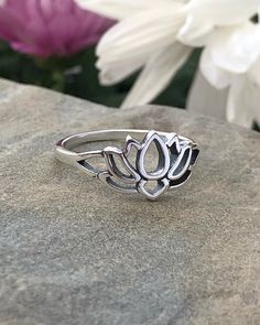 Sterling Silver Lotus Flower Ring | The Life Divine The lotus flower has been adopted by Eastern cultures as a symbol of regeneration and personal growth. Wear to remind you of the potential within. The lotus is the symbol of new beginnings and infinite potential. Sterling Silver Lotus measures approximately 3/8" H x 5/8" W “The lotus flower is a reminder of the beauty that comes from change, the magic that a new beginning brings and the seed of potential that is buried in the most unlikely plac Spiritual Sterling Silver Flower Ring, Lotus Flower Ring, The Lotus, Size 10 Rings, Flower Ring, Lotus Flower, New Beginnings, Personal Growth, Lotus