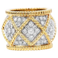 This exquisite Diamond 18K Gold Elegant Wide Cocktail Ring is the perfect complement to any ensemble  Expertly crafted in heavy solid 18K white and yellow gold, composed by (93) Genuine Diamonds,  Round Cut, pave set, with an approximate weight of 4.35 carats (G-H color, VS, SI Clarity) The Diamonds are Full of Shine and Sparkle. The whole piece weighs 17.0 grams and measures 16.5 mm wide  x 3 mm in height US size 5 Remains in excellent condition Accompanied by a professional appraisal document. Luxury Diamond Ring With Decorative Band, 1980s Design, Weight Measurement, Jewelry Appraisal, Denim Skirt Women, Eternity Band Ring, Gems Jewelry, Eternity Band, Selling Jewelry