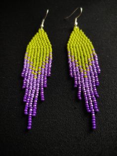 Purple Earrings With Beaded Fringe, Purple Beaded Earrings With Tassels For Gift, Purple Tassel Drop Earrings With Dangling Beads, Purple Jewelry With Beaded Fringe And Round Beads, Purple Beaded Earrings With Tassels, Purple Beaded Earrings With Colorful Beads, Purple Beaded Long Drop Earrings, Purple Beaded Tassel Earrings Gift, Purple Tassel Earrings With Dangling Beads For Gift