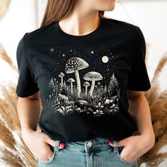 Mushroom Shirt, Celestial T-shirt, Magical Fungi Shirt, Moon Phases Stars, Goblincore Aesthetic, Cottagecore, Dark Academia - Etsy Black Graphic Tee With Mushroom Print, Black Crew Neck T-shirt With Mushroom Print, Black Crew Neck Top With Mushroom Print, Black Short Sleeve Top With Mushroom Print, Goblincore Aesthetic, Cottagecore Dark Academia, Mushroom Shirt, Cottagecore Dark, Aesthetic Cottagecore