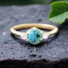 14k Turquoise Diamond Ring 5.0MM Three Gemstone Turquoise Engagement Ring December Birthstone Prong Set Jewelry Anniversary Gift For Love Main Stone -Turquoise (Lab Created) Stone Size - 5 mm Stone color - Blue Stone shape - Round Second Stone- CZ Diamond Stone color-Colorless Stone Shape-Round  Finishing- Excellent feel free to contact me if you have any questions Gemstone color may slightly vary from listed image due to the nature of all natural gemstone or different monitor settings TURNAROUND TIME Your order will be ready for shipment in 4-8 business days. Free economy shipping for US, UK, Germany- 10-15 business days delivery time. shipping upgrade available for US, UK, Germany- 5-7 business days delivery time. Please check shipping times for other countries by entering your country a Adjustable Gold Turquoise Ring For Wedding, Turquoise Gemstone Jewelry For Promise Ring, Turquoise Jewelry With Gemstone Accents For Promise Ring, Adjustable Turquoise Gemstone Ring For Weddings, Turquoise Three Stone Ring As A Gift, Turquoise Three Stone Ring For Gift, Turquoise Accent Stones Promise Ring, Turquoise Gemstone Birthstone Ring For Wedding, Turquoise Birthstone Ring With Accent Stones