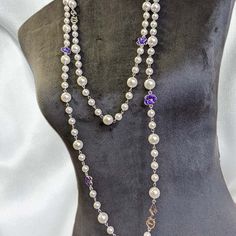 For the members of Delta Sigma Theta Sorority who take their violets with their pearls. This extra long sweater chain necklace includes violets and pearls. It is 72 inches in length and hangs 36 inches as a single loop. Product Description: Length: 36 inches (single strand) Wear as a double strand or triple strand High-quality glass pearls 3 lavalier DST symbols and 9 African violets Finish options include 18k gold plated or Rhodium plated Theta Sorority, Delta Sigma Theta Sorority, Founders Day, Pearl Chain Necklace, Delta Sigma Theta, Pearl Collection, Long Chain Necklace, Sweater Chain, African Violets