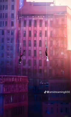 two people in the air on some kind of rope above buildings and skyscrapers at sunset