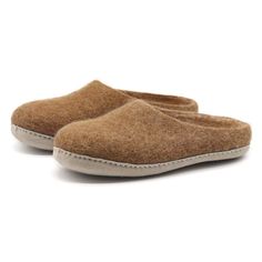 PRICES MAY VARY. PREMIUM QUALITY: Our wool house slippers for men are cozy, comfortable and convenient made with the highest quality, all natural materials. They are handmade by artisans with each pair taking 3 days to make. WARM FELTED WOOL: Cozy wool felt slippers are the best for cold feet. Natural wool insulates, breathes and keeps feet at a comfortable temperature. Superior to boiled wool, felted wool is soft and good for sensitive skin. BAREFOOT FEEL: Generous toe box is flexible and allow Slipper For Women, Cheap Slippers, Chocolate Wrapping, Alpaca Socks, Best Slippers, Felted Slippers, Better Posture, Wool Slippers, Warm Slippers