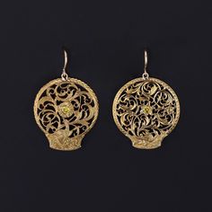 These antique earrings were created from Georgian watchcocks (circa 1780-1800) by adding yellow diamonds and 14k gold ear wires to the gold gilt (or pinchbeck) dangles. Each earring measures 1.25 inches from the top of the ear wire to bottom by 0.8 inches wide and are in great condition. We have many other fantastic offerings of period fine and costume jewelry posted on our Etsy store, so please consider browsing our other items. We send all items in individually packaged gift boxes and offer la Yellow Diamonds, Jewelry Post, Diamond Flower, Antique Diamond, Antique Earrings, Antique Shops, Flower Charm, Yellow Diamond, Etsy Fashion