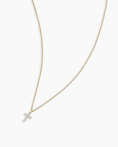 This understated diamond cross necklace can beautifully add to any outfit with its subtle shimmer. To enhance your look, layer your dainty diamond necklace with other chains or add a pop of color with a strand of beautiful gemstones. Diamond Cross Necklace in 14k Solid Gold, Women's by gorjana Yellow Gold Diamond Cross Necklace, Small Diamond Cross Necklace, Gold Cross Necklace For Women, Silver Diamond Cross Necklace, Gold Diamond Cross Necklace, Diamond Cross Necklace Gold, Diamond Cross Necklace, Gorjana Jewelry, Dainty Diamond Necklace