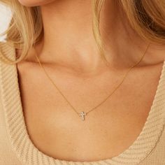 The 14K Gold Pave Cross Necklace comes in 3 sizes and is handset with approximately 0.05-0.12ct of diamonds. Hangs on a dainty chain and is perfect for layering or wearing on its own every day. 

Approx. 0.05-0.12ct
High  Quality G-H Color VS2-SI1 Clarity Natural Diamond

Solid 14K Gold
Lifetime Guarantee
Made in Los Angeles Gold Diamond Cross Necklace Gift, Dainty Yellow Gold-plated Cross Necklace, Dainty 14k Gold-filled Cross Necklace, Yellow Gold Cross Pendant Necklace For Baptism, 14k Gold-filled Yellow Gold Cross Necklace As Gift, Dainty Chain, Pave Diamonds, Cross Necklace, Natural Diamonds