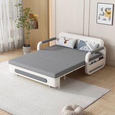 a bed that is sitting on top of a rug