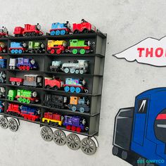 there is a toy truck and train on the wall