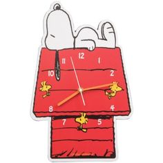 a clock with snoopy on it is shown