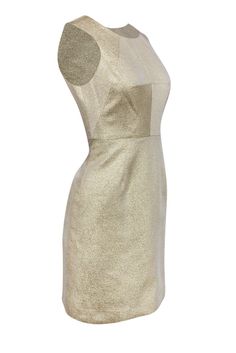 In this dress, you won’t even need to have a star on the top of the tree this year — you’ll be shiny enough! Gorgeous metallic gold covers the exterior of this piece from Shoshanna, creating the perfect holiday look for any party. The sheath silhouette will complement your figure, so pair with stilettos to elongate your legs and you’re ready for soiree season! Size 2 Shell: 40% Polyester, 39% Cotton, 21% Metallic Lining: 100% Poly Stretch Made in USA Concealed back zipper Lined Sheath silhouette Gold Shimmer Holiday Dresses, Chic Gold Festive Dress, Chic Festive Gold Dress, Chic Metallic Shimmer Dress, Gold Sleeveless Dress For Party Season, Elegant Gold Holiday Dress, Fitted Shimmer Dress For Festive Season, Gold Shimmer Dress For Party Season, Chic Metallic Festive Dresses