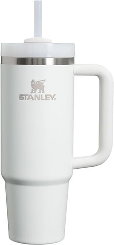 the stanley coffee cup is white and has a stainless steel lid, with a handle