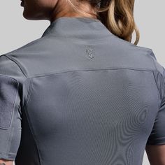 Experience comfort and reliable protection with our Op Top tailored to the female frame. Featuring abrasion-resistant stretch fabric at the shoulders and arms, side zippered arm pockets with loop Velcro patches and pen pockets, and BP Shield technology for odor control, hyper-evaporation, UVA/UVB protection and cooling power technology, this shirt is designed to keep up with every demand of the job. Black Military Style Tops For Outdoor, Military Style Short Sleeve Outdoor Tops, Long Sleeve Military Cotton Tops, Military Style Short Sleeve Top With Button Closure, Outdoor Military Short Sleeve Shirt, Velcro Patches, Keep Up, Stretch Fabric, Pen