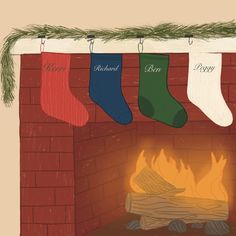 stockings hanging over a fireplace with fire in it