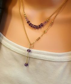 Natural gemstone purple amethyst layered Y necklace with real 14k gold-plated brass rolo chain. Set of 2 pieces. Chain: real 14k gold-plated brass is 2mmx 2mm (small chain) with hand wire natural gemstone purple amethyst (4-6mm) connector and 18k gold plated spacers. Each necklace measures: 15-17 inches (includes 2" extension chain). Drop down 1.25" Material: -natural gemstone, real 14k & 18k gold-plated brass -------------------- SHIPPING ◊ Get your orders FAST! Our processing time is only 1-2 business days for most orders.  ------------------- JEWELRY PACKAGING ◊ This item comes packaged in our high quality metal jewelry box with red velvety cover and white satin lining inside lid - ready to gift! -------------------------- CUSTOMER SERVICE: * We pride ourselves on our quick response tim Y Necklace Gold, Antique Things, Necklace Gold Chain, Natural Gemstone Necklace, Layered Necklace Set, Y Necklace, Amethyst Necklace, Rolo Chain, Gold Chain Necklace