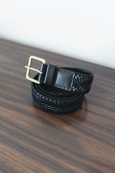 Whether you're attending a formal event, heading to the office, or simply elevating your everyday style, this belt adds a touch of luxury to your ensemble. Redefine your approach to fashion with a belt that seamlessly combines elegance and endurance. 100% leather Large square buckle Buckle Width: 1.3/4" Buckle Height: 2.2/8" Weaved design Classic Office Belt With Belt Loops, Black Belt For Office Wear, Fitted Black Belt For Office, Chic Black Business Belts, Chic Black Belt For Business, Elegant Fitted Belts And Suspenders With Matching Belt, Classic Black Belt For Business Casual, Luxury Formal Belt Buckles With Belt Included, Luxury Fitted Belts With Belt Loops