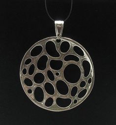 Sterling silver pendant - PE000493. APPROXIMATE WEIGHT 4.0 GRAMSDIAMETER 3.3CM (1.32 INCHES) All our jewels are made from solid sterling silver 925/1000 and are carefully crafted by hand in our family workshop.We dispatch your orders in 5 working days, worldwide and the postage is $5. We ship registered priority mail. Please allow 5-7 working days for delivery in Europe and 10-15 working days outside Europe.For any questions – please do not hesitate to contact me! Nickel-free Silver Round Necklace, Silver Circle Necklace With Polished Finish, Silver Jewelry With Large Round Disc Pendant, Silver Hypoallergenic Round Pendant Jewelry, Silver Hypoallergenic Jewelry With Round Pendant, Silver Hypoallergenic Necklace, Hypoallergenic Silver Jewelry With Round Pendant, Hypoallergenic Silver Necklace, Sterling Silver Coin Pendant Jewelry