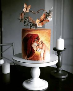 there is a cake with a painting on it