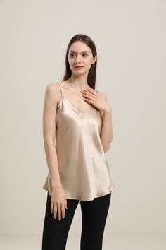 100% Mulberry Silk Breathable & Lightweight Lightweight & Comfortable Type: V Neck Silk CamisoleMaterial: 19Momme Charmeuse Silk Features: Satin, wear-resistant and stylish.Details: This light, regular fitted silk cami is a must-have, with its V-neck cut and adjustable straps to fit your preferred style. It is the perfect addition to any outfit, great for a night out, and can be paired with loungewear for a comfortable night in. Feminine Silk V-neck Tank Top, Feminine Silk V-neck Camisole, Silk Feminine V-neck Tank Top, Silk V-neck Tank Top For Night Out, Silk V-neck Tank Top, Elegant V-neck Camisole For Summer, Elegant Silk V-neck Tank Top, Sleek Silk V-neck Camisole, Elegant V-neck Summer Camisole