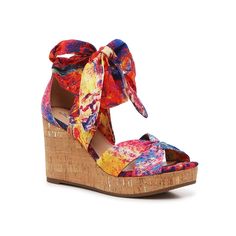 Impo-Oasis Wedge Sandal Bursting with color, the Oasis wedge sandal is sure to bring beachy vibes to your look. The cork wedge heel elevates the look, while the tie closure catches the eye. Summer Beach Lace-up Wedge Sandals, Adjustable Lace-up Wedge Heel Sandals For Vacation, Beach High Heel Lace-up Synthetic Sandals, Vacation Lace-up Platform Sandals In Synthetic Material, Vacation Lace-up Platform Sandals In Synthetic, Synthetic Platform Lace-up Sandals For Vacation, Platform Lace-up Sandals For Vacation, High Heel Synthetic Lace-up Sandals For Beach, Trendy Lace-up Sandals With Wrapped Heel For Beach