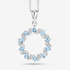 "Swiss Blue Topaz Pendant, Wreath Design Natural Swiss Blue Topaz Silver Pendant Necklace for Women, December Birthstone Pendant Necklace Product Details:  .925 Sterling Silver Stone Details: Swiss Blue Topaz Item Type: Pendant Subcategory: Blue Topaz Gross Wt: 5.35 Gemstone Wt: 1.30 ctw Total Stone Wt: 1.30 ctw Finish: Rhodium Plated Product Style: Circle Pendant Chain Type: Cable Chain Clasp: Spring Ring Clasps Total Qty Of Stones: 30 Height: 4.57 MM Width: 22.35 MM Length: 33.53 MM Primary St Light Blue Round Cubic Zirconia Jewelry, Light Blue Cubic Zirconia Jewelry, Light Blue Round Birthstone Jewelry, Round Topaz Necklace With Diamond Accents, Round Topaz Necklaces With Diamond Accents, Light Blue Jewelry With Diamond Accents, Round Light Blue Topaz Necklace, Light Blue Round Blue Topaz Necklace, Anniversary Blue Topaz Round Necklace