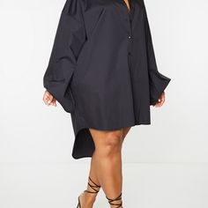 Make A Serious Style Statement In This Shirt Dress. Featuring A Black Material With A Balloon Sleeve Design And Button-Up Detail. Wear This With Heels And Hoop Earrings For A Simple But Chic Combo. Fabric And Care 55% Cotton 45% Polyester Never Warn/ New With Tags Smoke And Pet Free Home Black Oversized Collared Dress, Oversized Black Collared Dress, Oversized Collared Dresses In Solid Colors, Black Long Sleeve Shirt Dress For Date Night, Black Mini Length Shirt Dress For Daywear, Oversized Black Long Sleeve Shirt Dress, Black Oversized Button-up Shirt Dress, Black Button-up Mini Dress For Daywear, Black Button-up Dress For Brunch