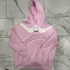 Nwt Nike Womens Nsw Pink Swoosh Oversized Fleece Hoodie Multi Size Fj8572-695 Nike Sporty Hoodie For Spring, Oversized Nike Hoodie For Streetwear, White Nike Hoodie For Loungewear, Nike White Hoodie For Loungewear, Nike Sporty Spring Hoodie, Nike Pink Hoodie, Light Pink Nike Hoodie, Nike Pink Sweatshirt For Streetwear, Nike Pink Long Sleeve Hoodie