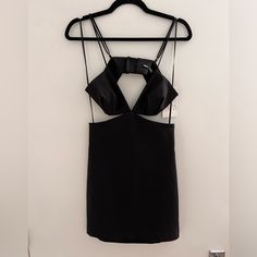 New. Size S. Backless Lined Mini Dress For Night Out, Chic Cutout Mini Dress For Date Night, Black Cutout Mini Dress For Party, Black Cutout Mini Dress For Date Night, Black Lined Backless Mini Dress, Chic Black Lined Bodycon Dress, Black Backless Mini Dress, Lined, Black Backless Lined Mini Dress, Black Lined Bodycon Dress For Party