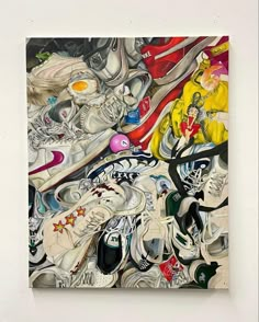 a painting on the wall with shoes all over it